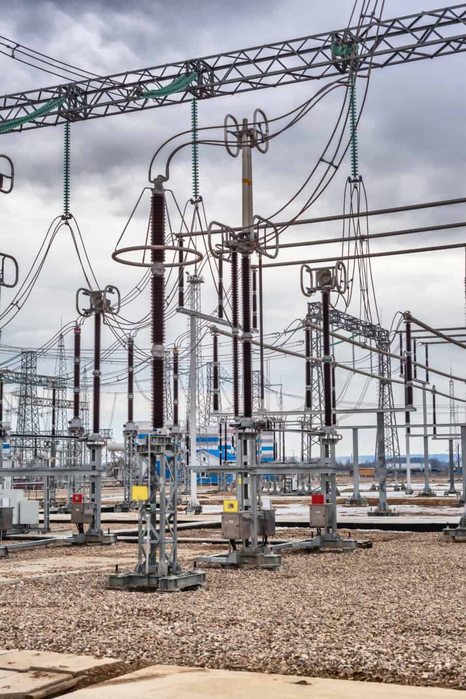 Electrical substation infrastructure with high-voltage equipment.